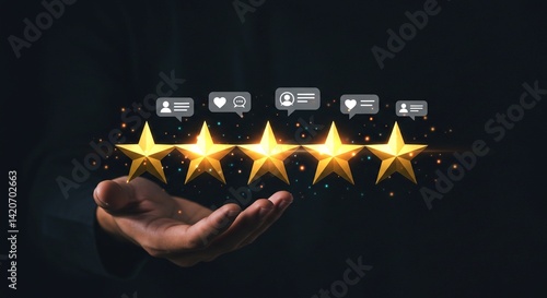 Close-up of hand under five shining stars with digital comment icons above
