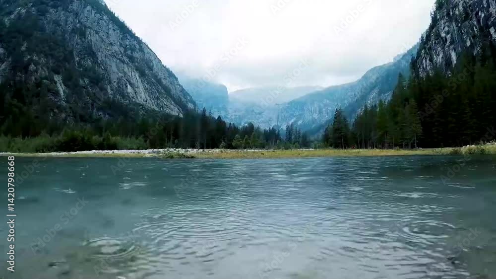 lake in the mountains with fogs