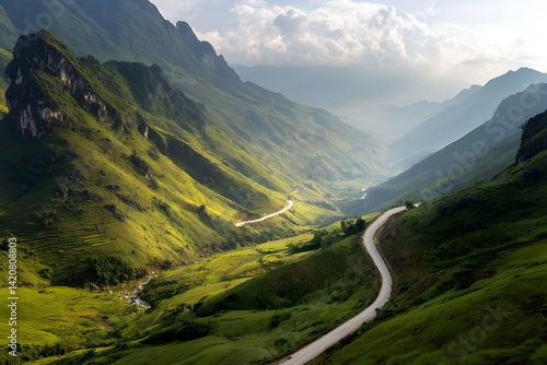 Scenic Winding Road Through Lush Green Mountains in Serene Landscape with Dramatic Sky