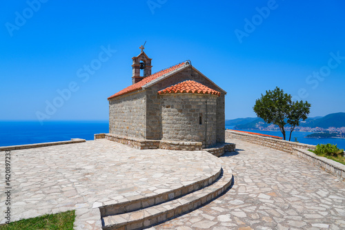 Obraz na płótnie St Sava church, a Serbian orthodox place of worship overlooking Sveti Stefan along the coast of the Adriatic Sea in Montenegro w salonie