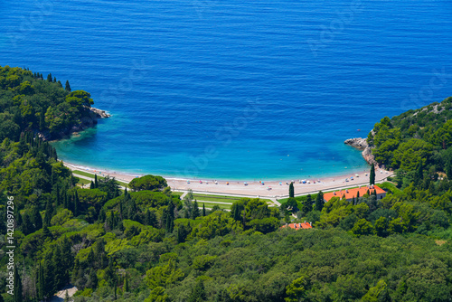 Obraz na płótnie Aerial view of Milocer beach near Budva along the coast of the Adriatic Sea in Montenegro w salonie