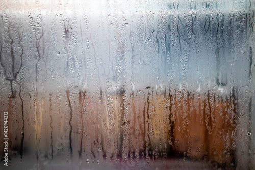 Dew on the glass door of a refrigerator
