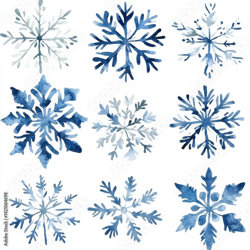 Nine delicate, stylized snowflakes in shades of blue.  Watercolor effect