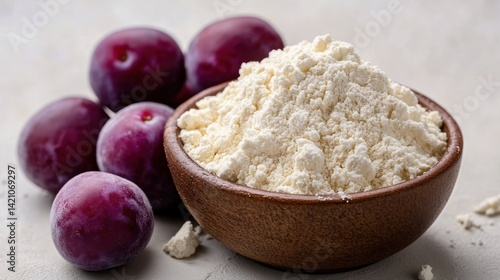 Plums and Flour in a Bowl
