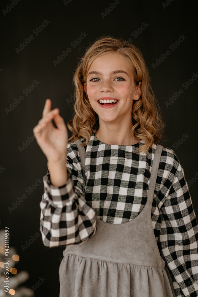 Portrait of a happy girl on a black background Portrait of a happy girl on a black background