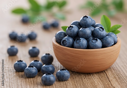 Wallpaper Mural A bowl filled with fresh blueberries sits on a rustic wooden table, surrounded by scattered blueberries and vibrant green leaves, showcasing the natural beauty of summer fruits Torontodigital.ca