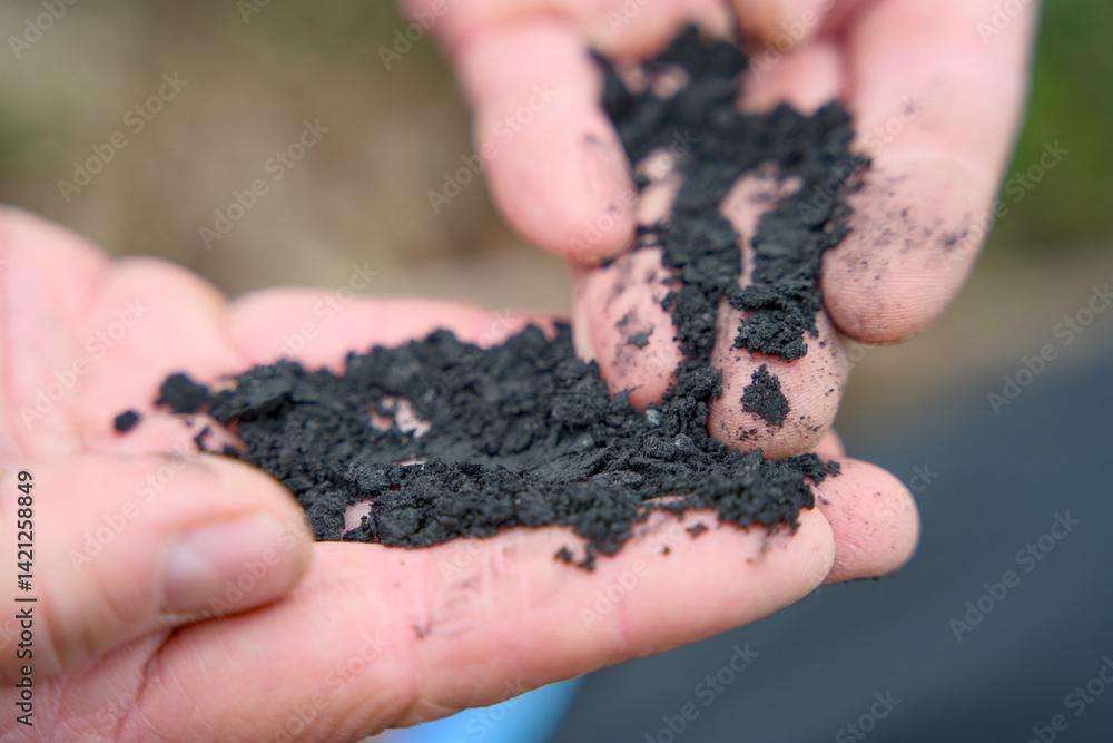 Close-up of biochar, produced through wood pyrolysis, a sustainable solution for carbon sequestration. Ideal for themes around CO2 reduction, climate change, and eco-friendly technology Close-up of biochar, produced through wood pyrolysis, a sustainable solution for carbon sequestration. Ideal for themes around CO2 reduction, climate change, and eco-friendly technology