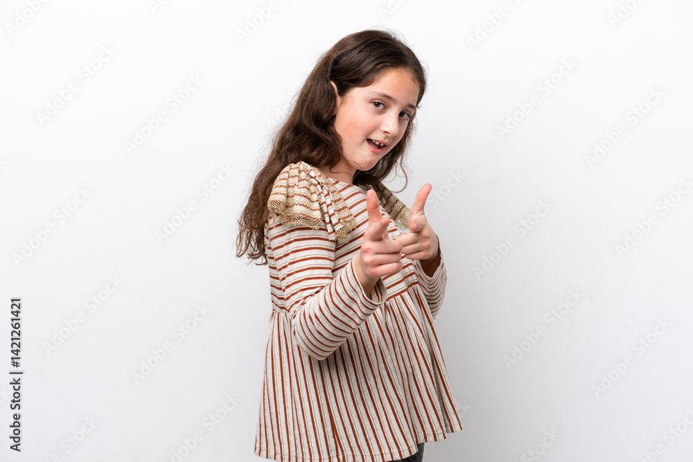 Little girl isolated on white background pointing to the front and smiling Little girl isolated on white background pointing to the front and smiling