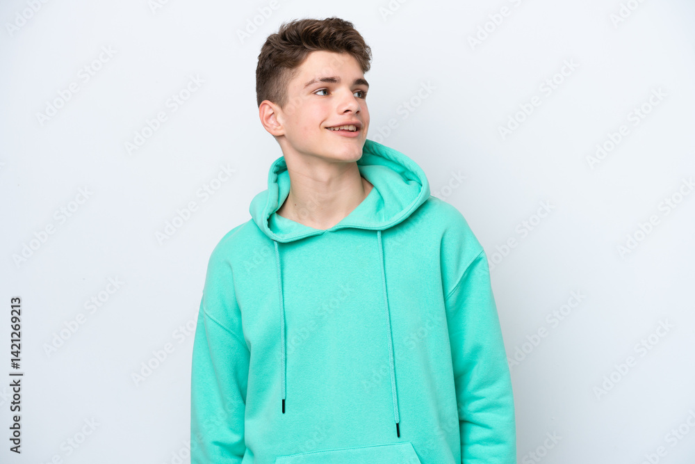Teenager Russian man isolated on white background thinking an idea while looking up Teenager Russian man isolated on white background thinking an idea while looking up