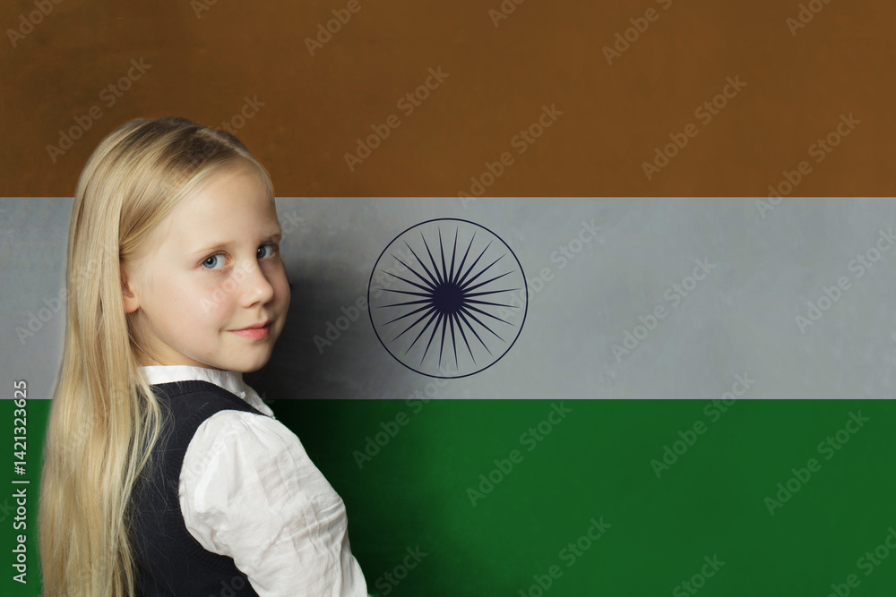 Cute young child girl on flag of India background. Education and study language concept Cute young child girl on flag of India background. Education and study language concept