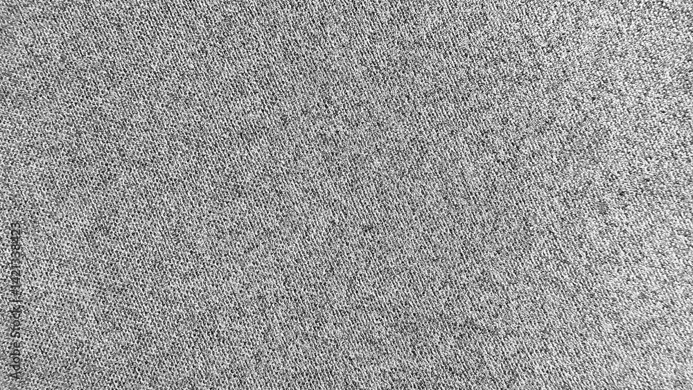 Fototapeta premium close-up texture of gray woven fabric for textile backgrounds, digital mockups, website design, product packaging, minimalist surface pattern