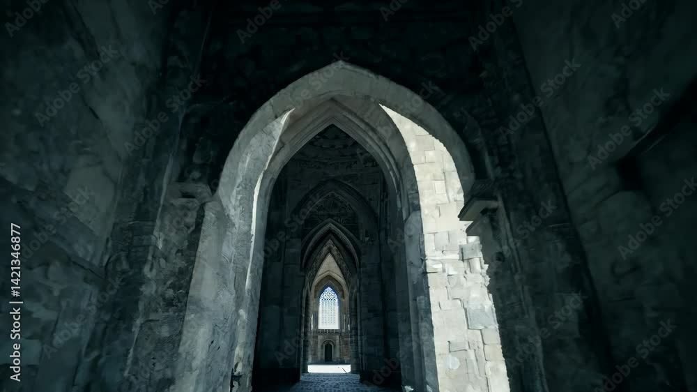 Camera zooms in through Gothic corridor where bounce light softly reveals the underside of arches, enhancing texture without breaking the moody tone. Concept of quiet mystery and architectural drama Camera zooms in through Gothic corridor where bounce light softly reveals the underside of arches, enhancing texture without breaking the moody tone. Concept of quiet mystery and architectural drama