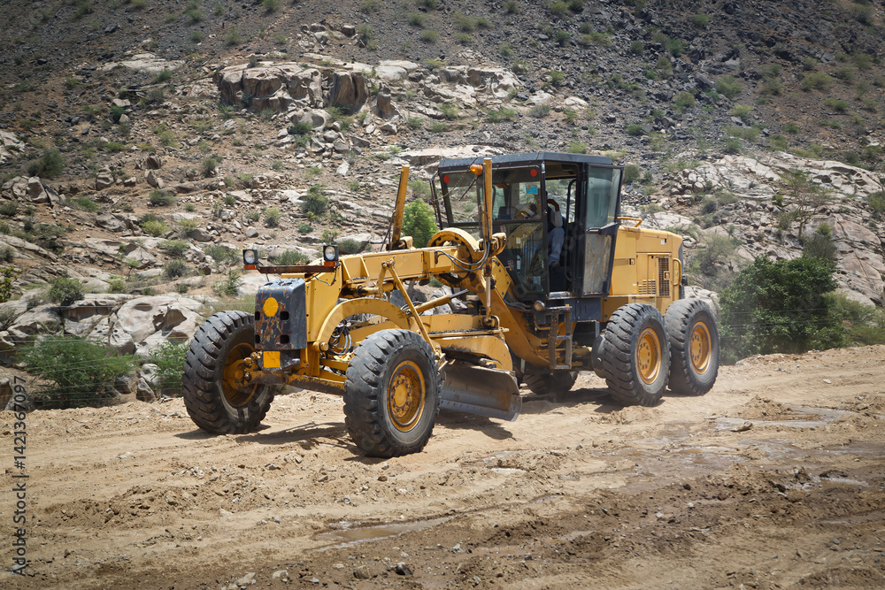 Construction machine motor grader during road Construction machine motor grader during road