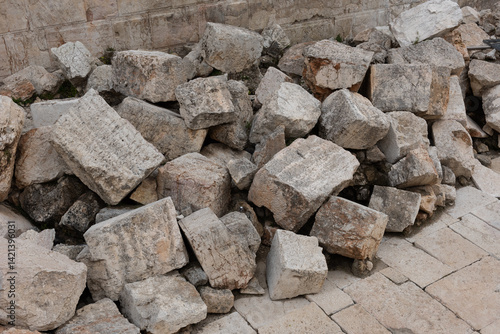 Valokuva Large pile of giant stones at the base of the Western Wall in Jerusalem, beneath Robinson's Arch, believed to be ruins of the Second Jewish Temple, destroyed by the Romans in 70 AD