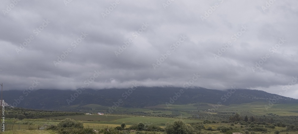 Fototapeta premium storm clouds over the mountains