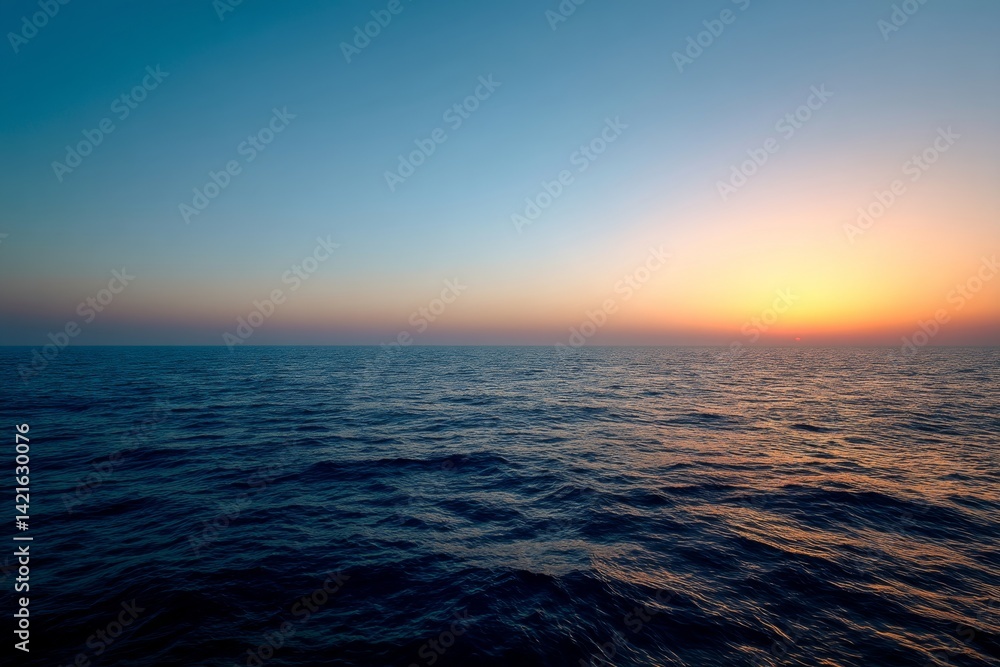 Obraz premium Ocean Sunset: Waves Reflecting Golden Hues, Tranquil Seascape at Dusk, Serene Water, Colorful Sky, Peaceful Evening, Horizon View, Calm Waters, Natural Beauty, Breathtaking Scenery, Twilight Glow