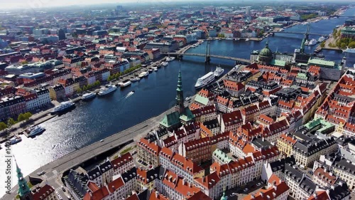 Aerial view of Copenhagen, Denmark, showcasing vibrant rooftops and waterways  