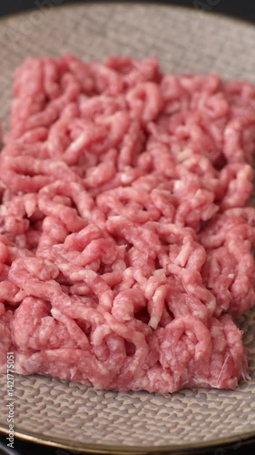 Wallpaper Mural Stuffing or ground raw beef or pork with salt and spices on a black background Torontodigital.ca