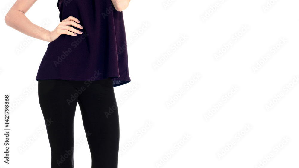 Slim woman wearing purple blouse and black tights with hand resting on waist standing on white background. Slim woman wearing purple blouse and black tights with hand resting on waist standing on white background.