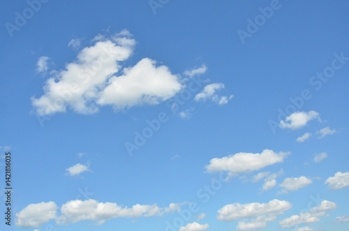 Blue sky with small curly white clouds landscape.Beautiful blue sky background .Nature ,environment.