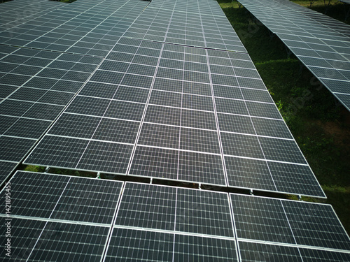 Solar panel at at the solar farm. Renewable energy. Aerial drone shot