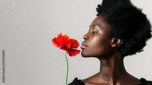 beautiful black woman with red flower.