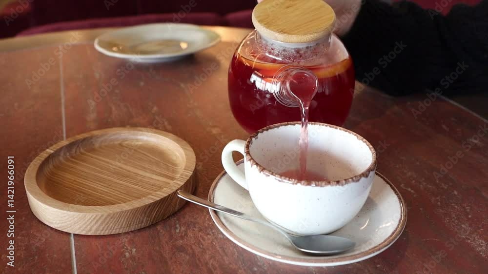 Tea Pouring Experience in a Cozy Caf Setting Tea Pouring Experience in a Cozy Caf Setting