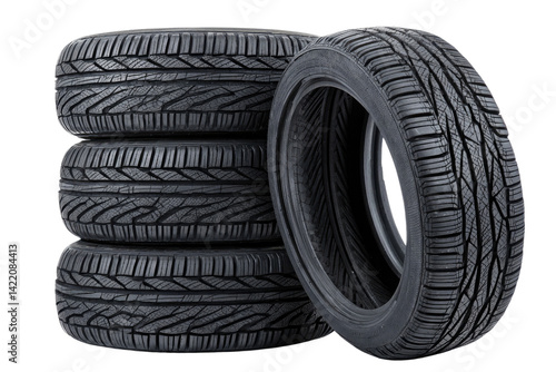 A stack of sturdy, reliable new car tires ready for the open road, showcasing deep tread and a robust design against a bright white background.