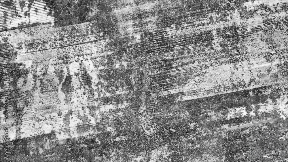 Gray wall with many cracks holes scratches and marks. wall is made of concrete and has a rough texture as an abstract texture background for template pages and banners. Gray wall with many cracks holes scratches and marks. wall is made of concrete and has a rough texture as an abstract texture background for template pages and banners.