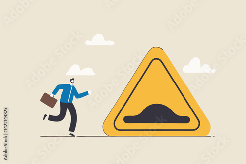 Business slow down due to obstacles, difficulty or speed limit, beware of crisis ahead or recession, economic depression concept, businessman running with arrow to find speed bump slow down sign.