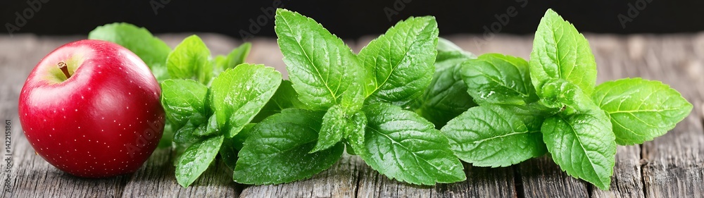 Apple and Fresh Mint on Wooden Surface Apple and Fresh Mint on Wooden Surface