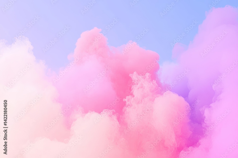 Fototapeta premium 青空を背景にピンクや紫の雲が立ち昇り、夢のような景色を作り出している。