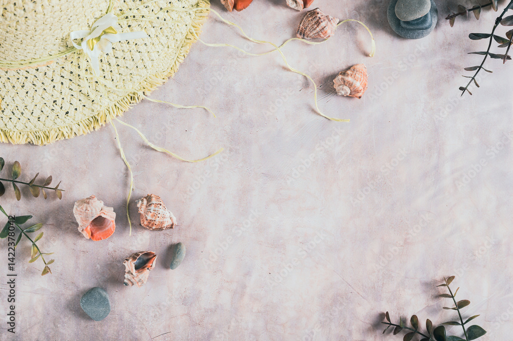 Travel background, hat, shells, stones and branches top view