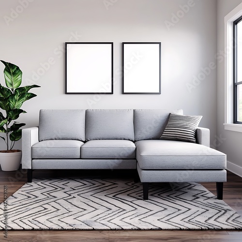 Obraz na płótnie Modern living area featuring a grey sectional couch, geometric rug, plant, and blank frames for artwork. w salonie