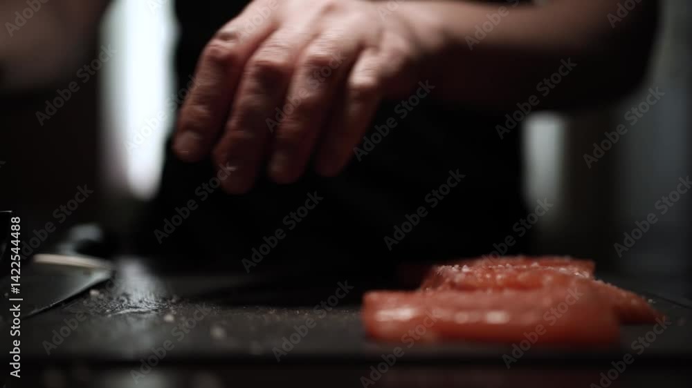 Chef Slicing the Fresh Salmon Chef Slicing the Fresh Salmon