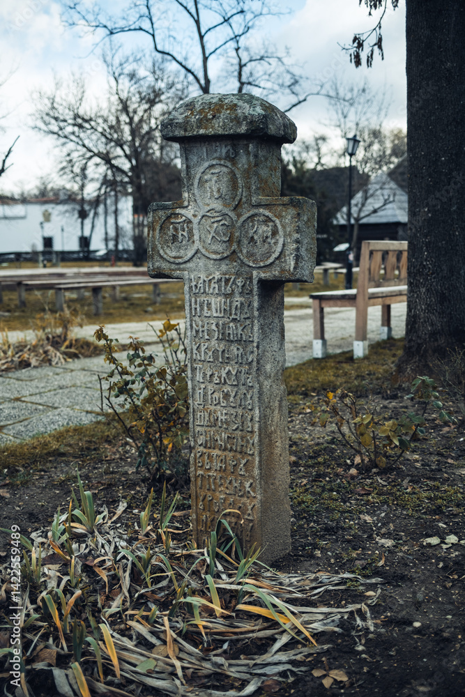 Stone Cross In The Middle Of An Old Romanian Village