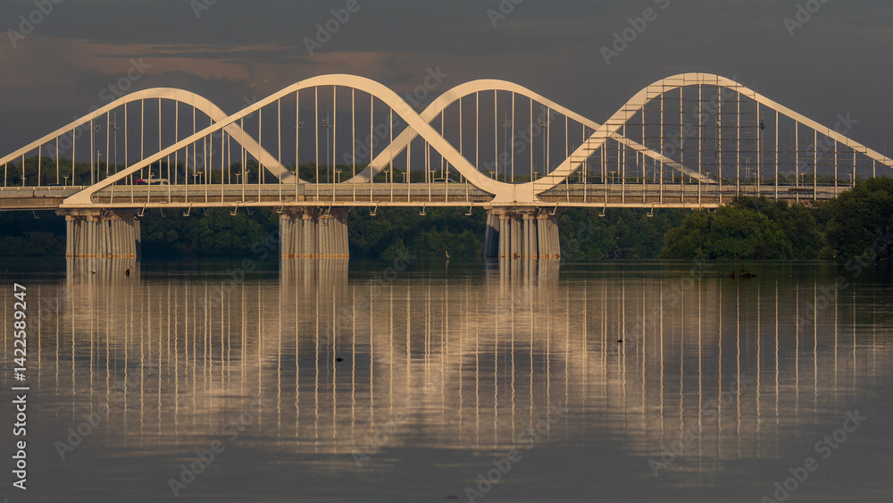 Fototapeta premium bridge over the river at sunset