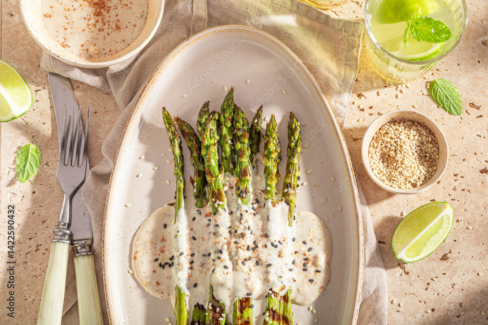 Hot roasted asparagus as food for vegetarian barbecue.