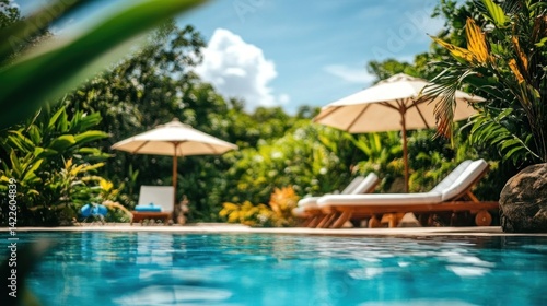 Wallpaper Mural Tropical resort poolside scene under sunny skies. Torontodigital.ca