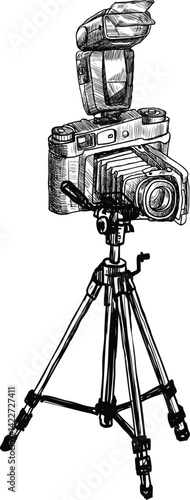 A classic vintage film camera on a tripod, isolated against a white background.