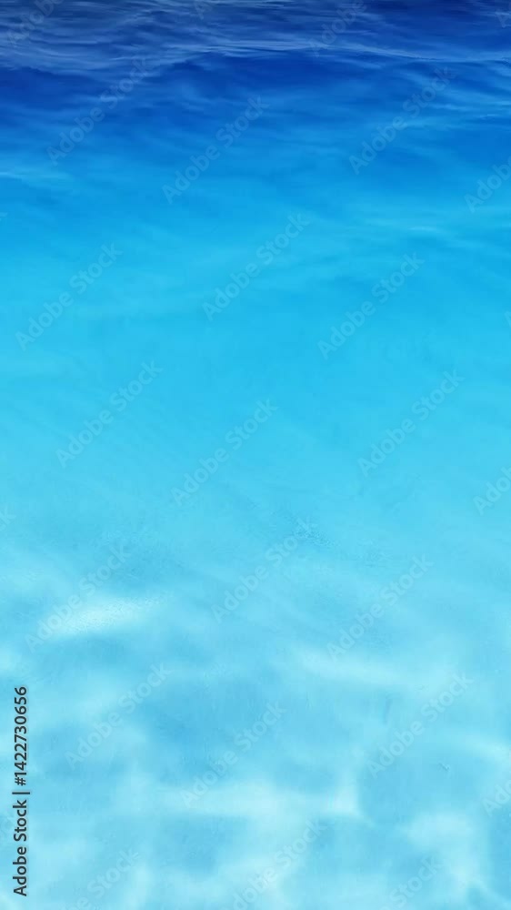 2160x3840. Swimming pool top view. Sea, water wave, ocean waves. Slow motion movement of blue water surface ripples and waves. Delicate ripples on the surface of the water with refraction of light. 2160x3840. Swimming pool top view. Sea, water wave, ocean waves. Slow motion movement of blue water surface ripples and waves. Delicate ripples on the surface of the water with refraction of light.