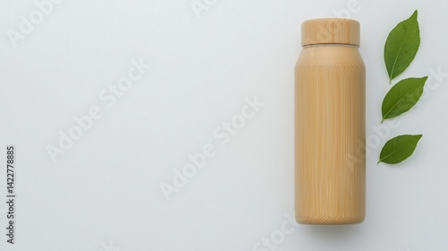 Wallpaper Mural A sleek, eco-friendly bamboo water bottle sits next to fresh green leaves on a light background, emphasizing sustainability and style. Torontodigital.ca