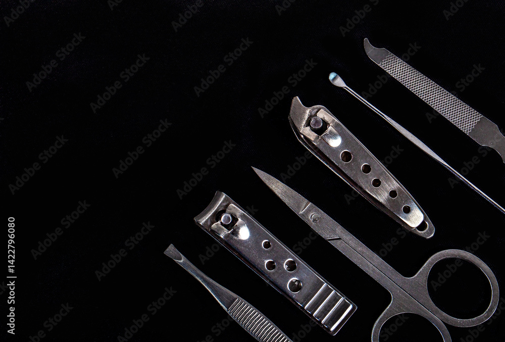 Set of nail care tools for health and beauty isolated on black background. A set of tools for Manicure and pedicure care