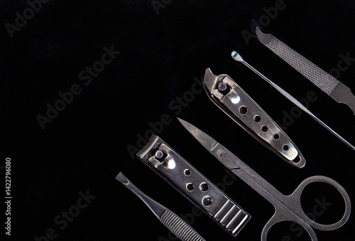 Set of nail care tools for health and beauty isolated on black background. A set of tools for Manicure and pedicure care