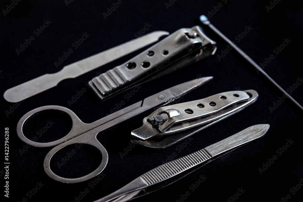 Set of nail care tools for health and beauty isolated on black background. A set of tools for Manicure and pedicure care