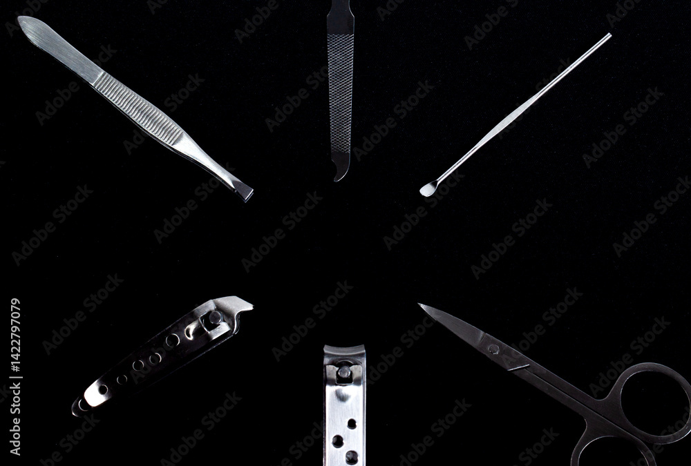 Set of nail care tools for health and beauty isolated on black background. A set of tools for Manicure and pedicure care
