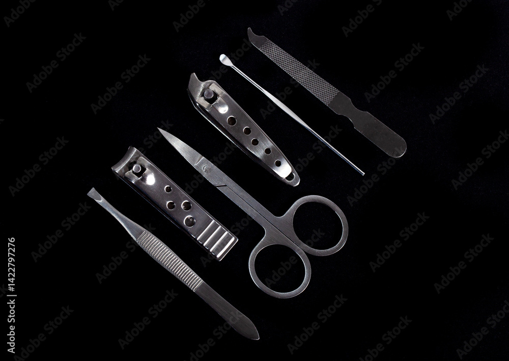 Set of nail care tools for health and beauty isolated on black background. A set of tools for Manicure and pedicure care