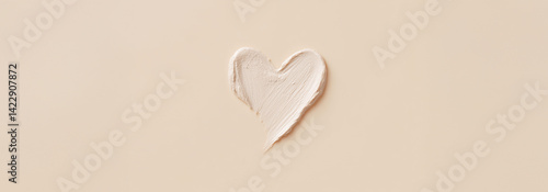 Obraz na płótnie Heart swatch of creamy white cosmetic on beige background with copy space w salonie