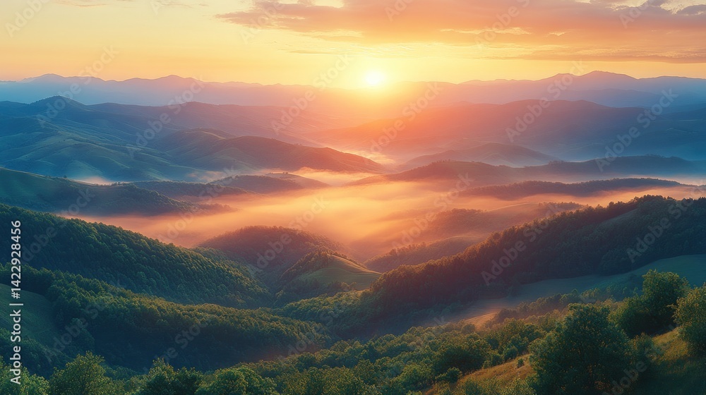 Fototapeta premium Sunrise Over Misty Mountain Ranges: A Breathtaking Panorama