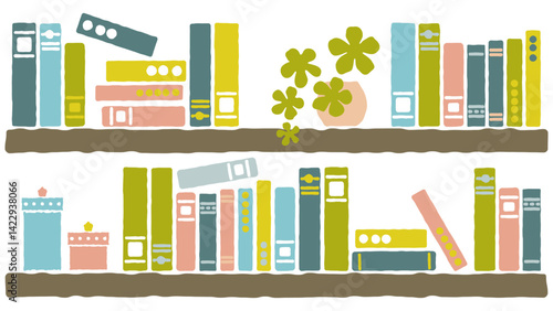 たくさんの本が並んだ本棚｜植物と小物入れ